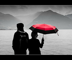 Lovere behind her red umbrella