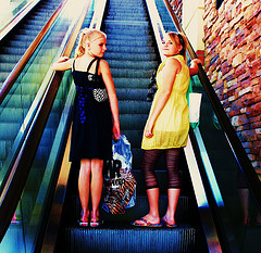 Free Mall Girls Riding on The Escalator Creative Commons